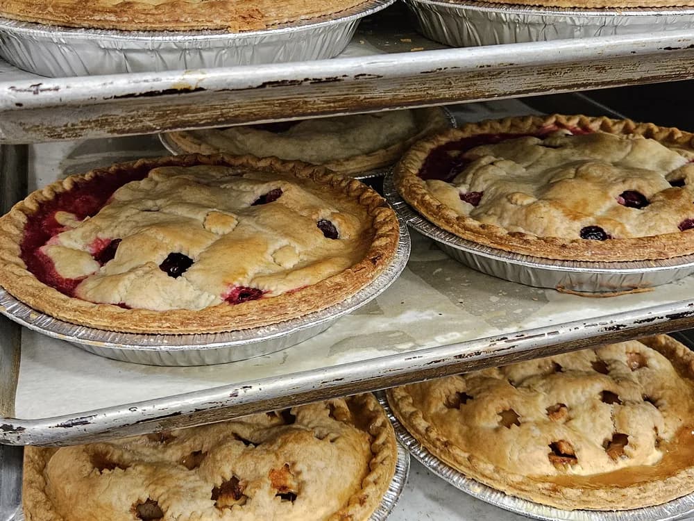 Racks of fresh-baked pies