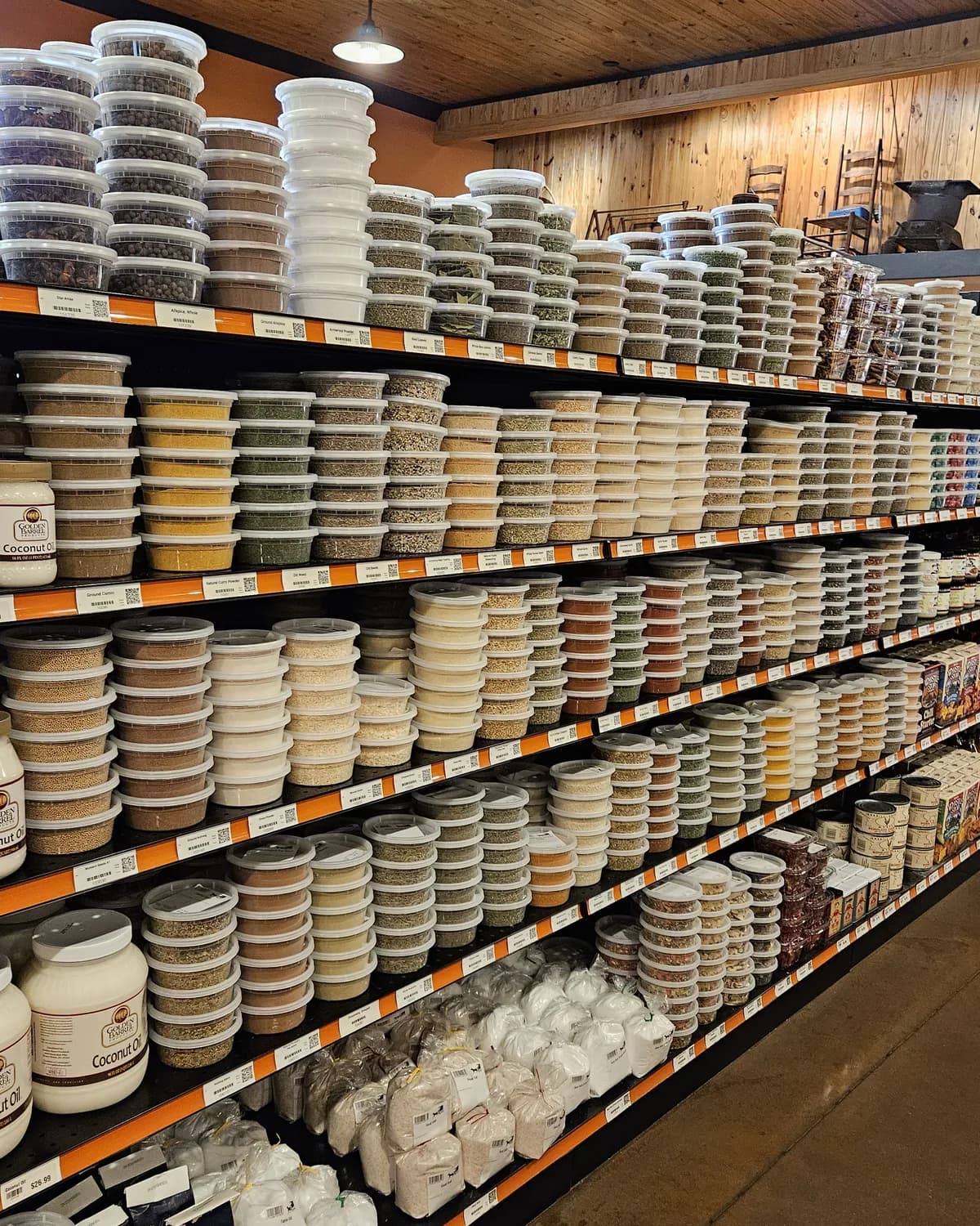 An aisle of bulk food containers at the store