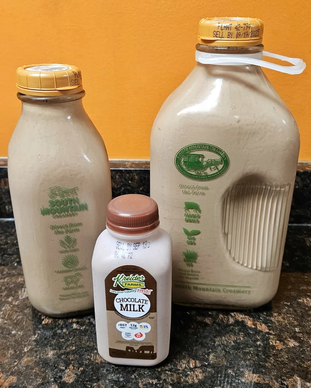 Bottles and a jug of chocolate milk