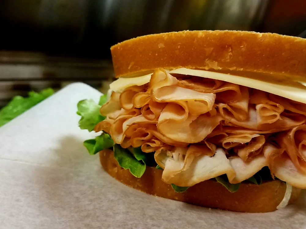 A turkey sandwich made to order at the deli counter